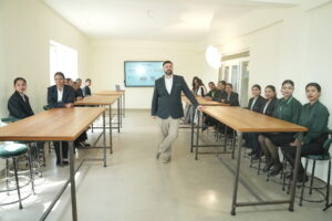 Alex from WSET London interacting with students at The Green Institute in Haldwani